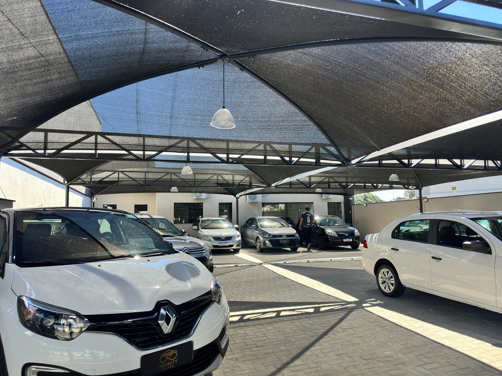 Infinity Veículos — cobertura tela HDPE FBM Dourado