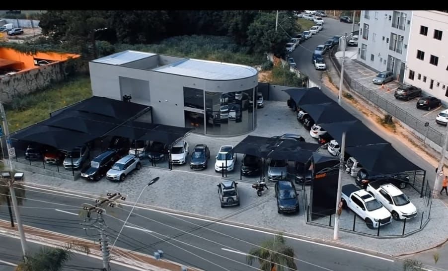Invest Veículos — cobertura tela HDPE drone FBM Dourado